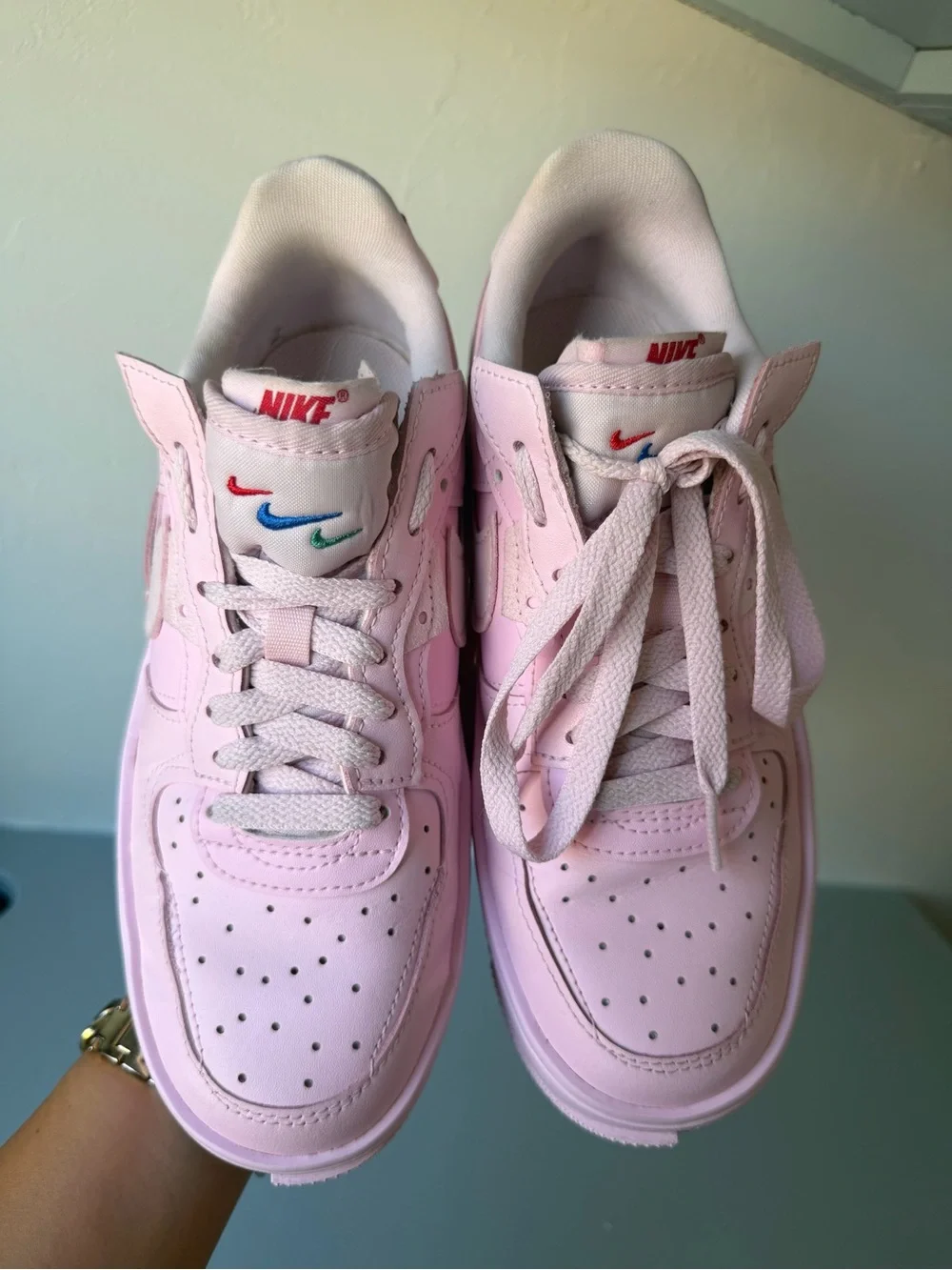 Nike Air Force 1 Women’s Light Pink Low-Top Sneakers with Red Accent